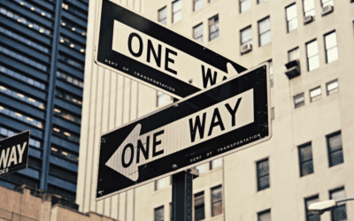 Two one-way street signs in city