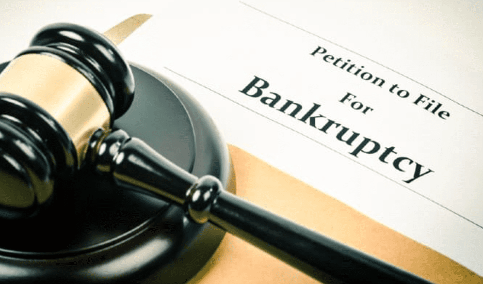 Gavel on bankruptcy petition document