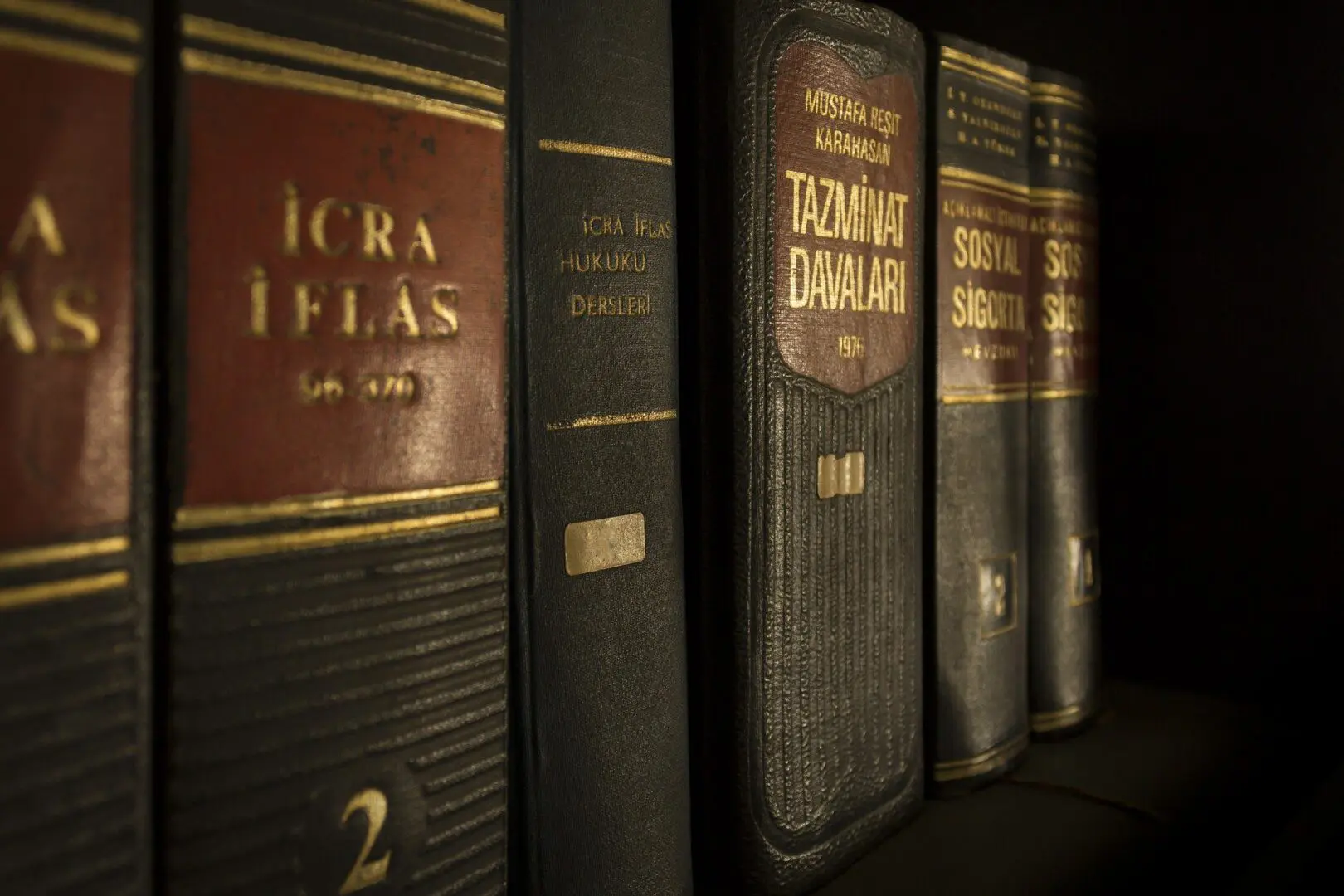 Vintage law books with gold lettering