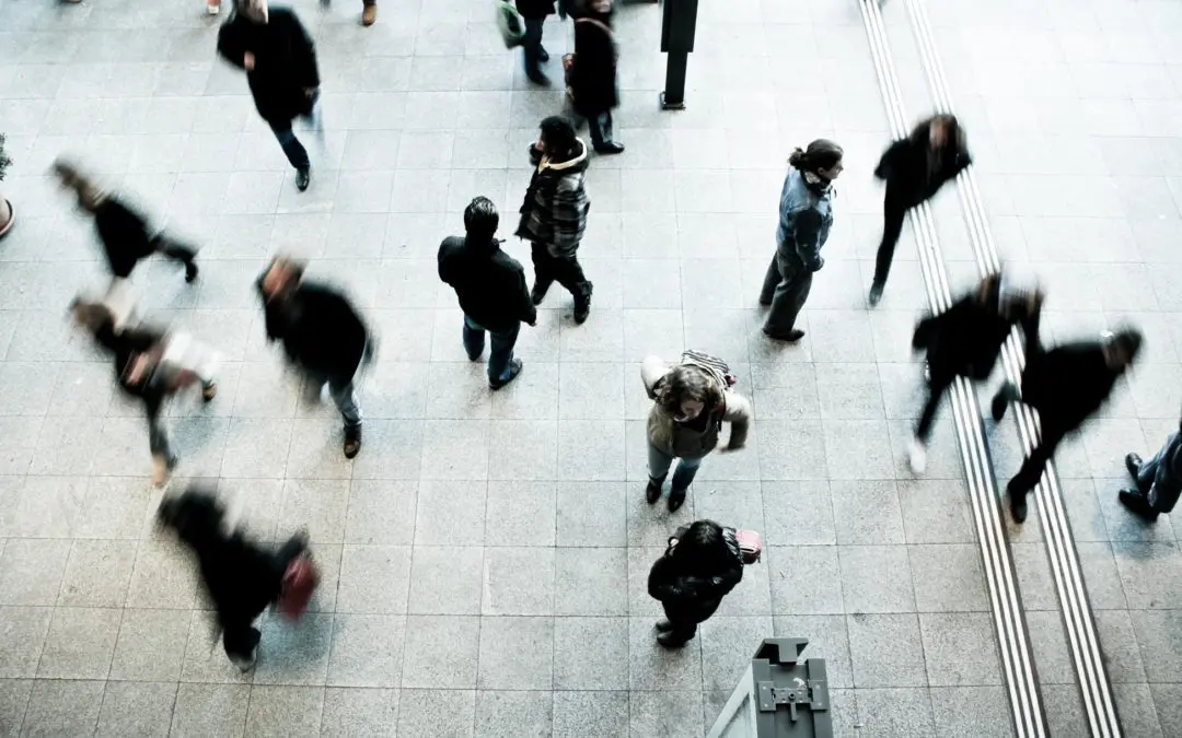 Overhead view of people walking in plaza