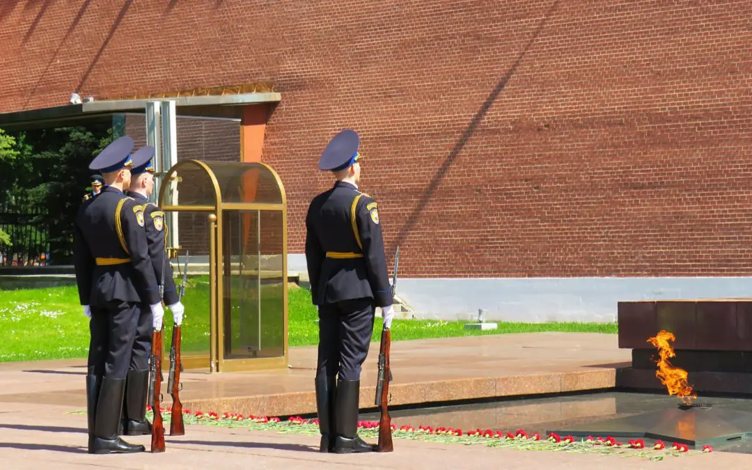 Soldiers guarding eternal flame memorial