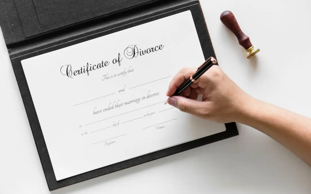 Hand signing divorce certificate